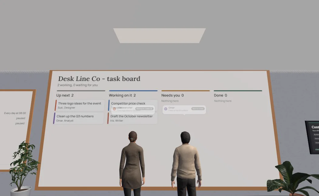 Two agents standing at the team board