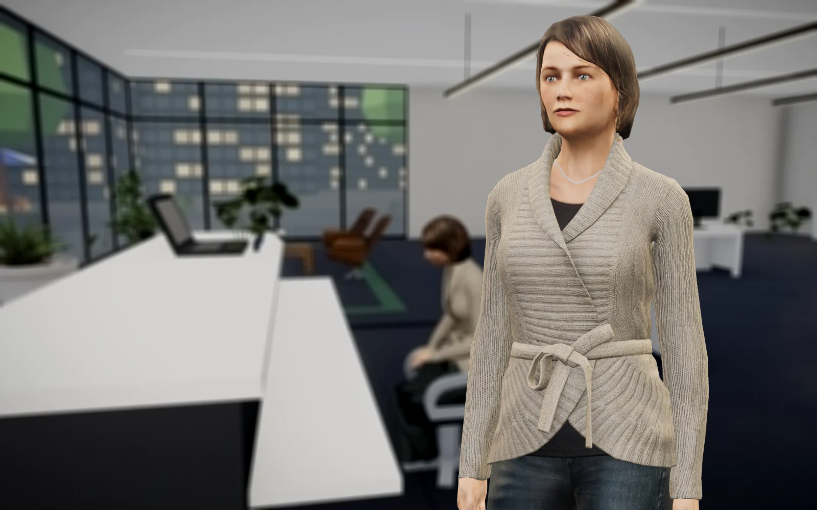 An agent mid-conversation on the office floor, a colleague working behind her